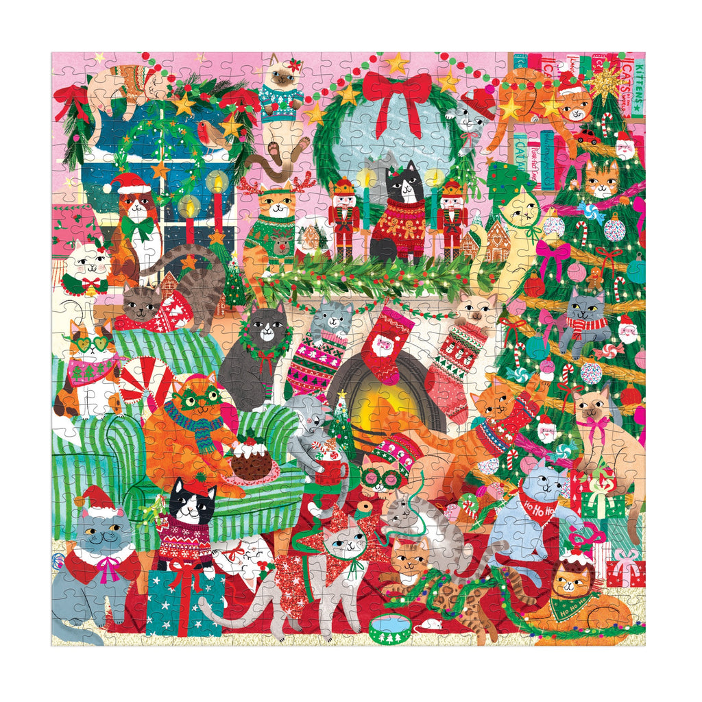 Celebrate a cozy Merry Catmas with the Rebecca Jones Merry Catmas! 500 Piece Family Puzzle, featuring dozens of festive cats in sweaters and hats, surrounded by Christmas décor, gifts, stockings, a fireplace, and a tree.