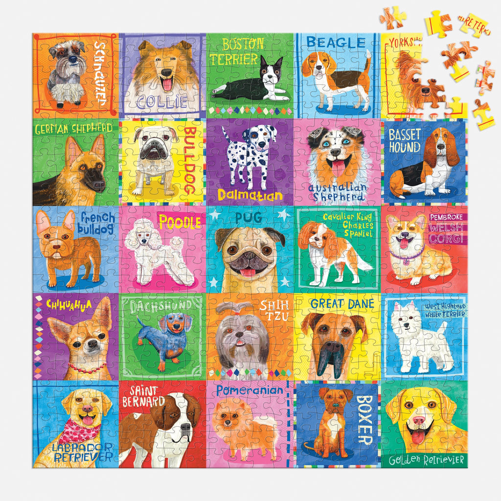The Allison Strine Pawsome Portraits 500 Piece Family Puzzle showcases 20 labeled dog breeds in vibrant squares, including a Golden Retriever piece—an ideal choice for pet lovers.