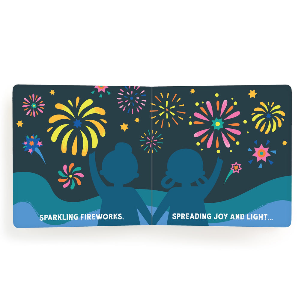 Two children hold hands, silhouetted against a night sky alive with fireworks. The Lets Celebrate Diwali Board Book by Nina Ghataora features the text: “SPARKLING FIREWORKS. SPREADING JOY AND LIGHT…”.