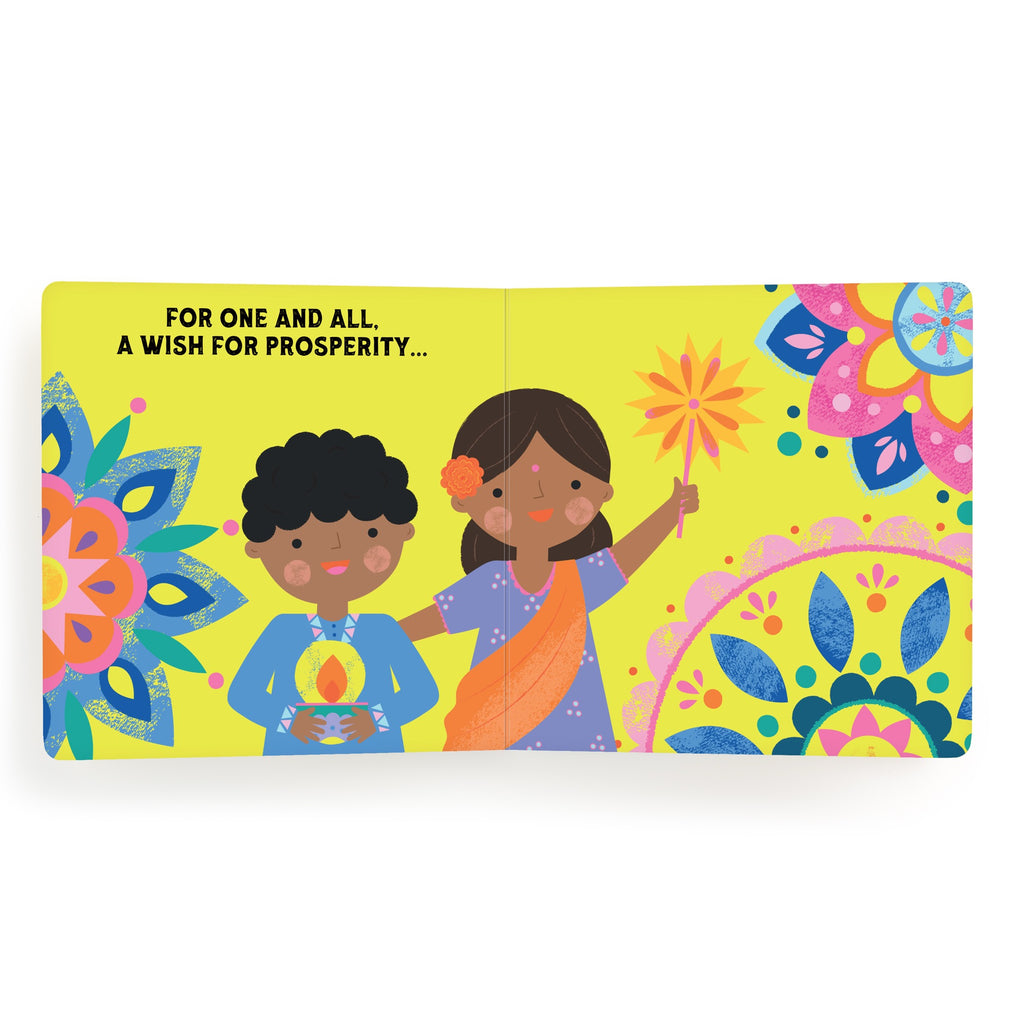 Two smiling children in festive clothes stand together. The girl holds a Diwali star decoration, surrounded by floral patterns on yellow. Text above reads: For one and all. A wish for prosperity... From Lets Celebrate Diwali Board Book by Nina Ghataora.