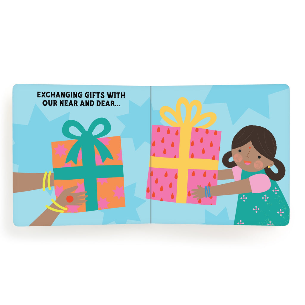 An illustration from Nina Ghataoras Lets Celebrate Diwali Board Book: a girl in a green dress exchanges a pink gift with yellow ribbon, while another hand offers a green and orange present. Text: Exchanging gifts during the Festival of Lights.