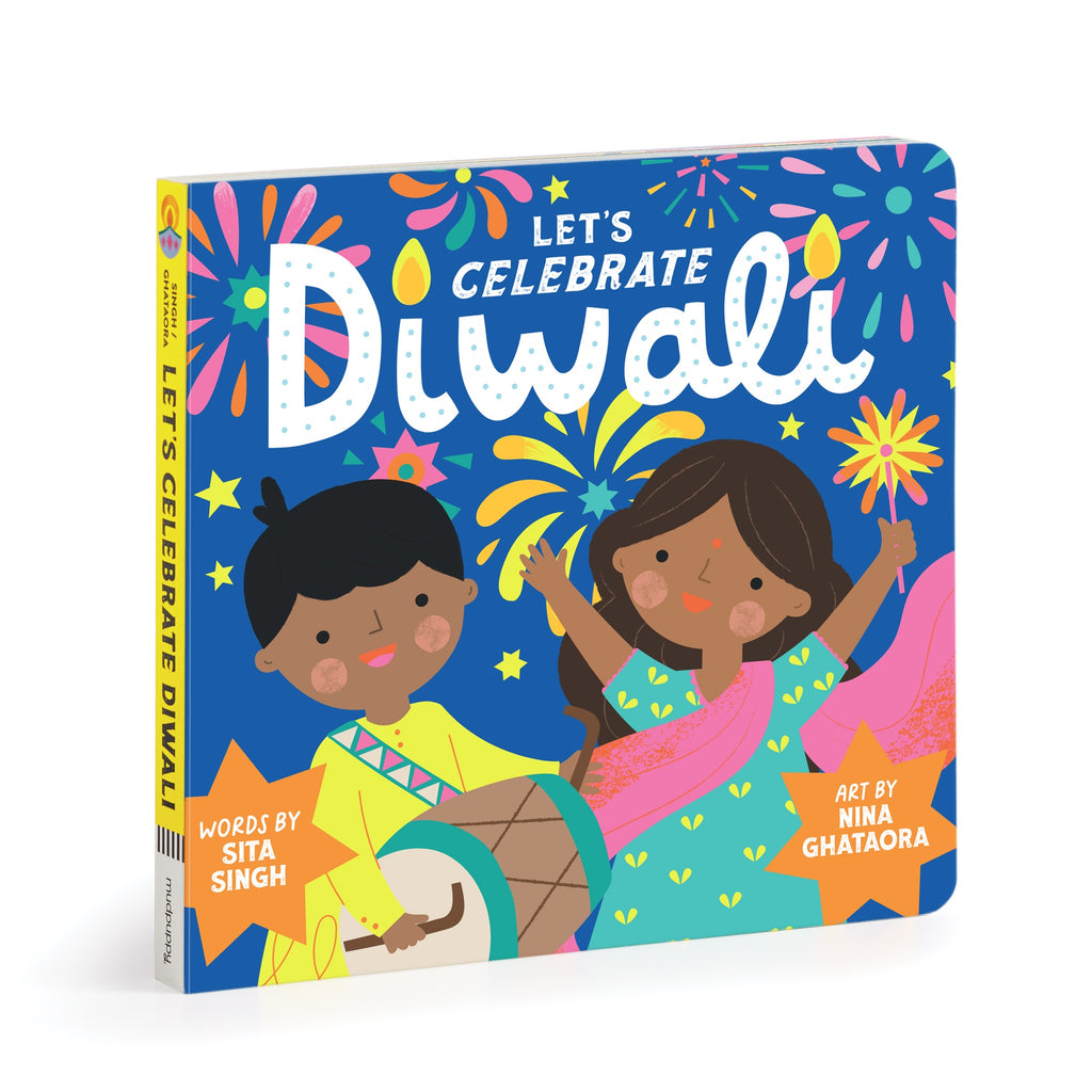 The Lets Celebrate Diwali Board Book by Nina Ghataora features two smiling children in colorful clothes, one with a drum, set against a dark blue background with fireworks and decorations, capturing the joyful spirit of Diwali.