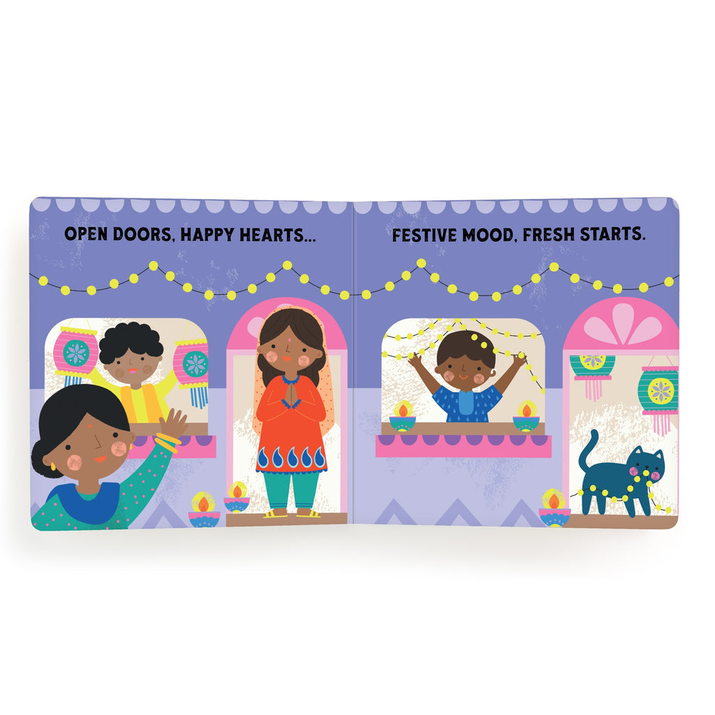 Lets Celebrate Diwali Board Book by Nina Ghataora shows three children and a cat in festive homes decorated with string lights. Two wave from windows, one stands excitedly, and a cat walks nearby—capturing the joy, fresh starts, and festive mood of Diwali.