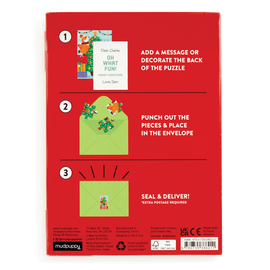 The Christmas Critters Greeting Card Puzzle by Ana Peake comes in a red package with three-step instructions: decorate the back, punch out pieces and place in envelope, then seal and deliver. Ana Peake logo appears at the bottom.