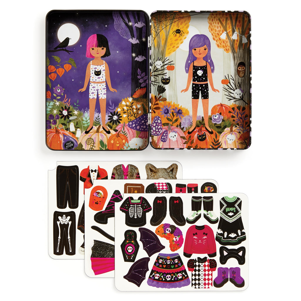 The Spooky Season Magnetic Dress-up Play Set by Jenny Miriam Hughes features two illustrated dolls, night and autumn forest scenes, pumpkins, animals, and mix-and-match magnetic clothing—perfect for imaginative play.