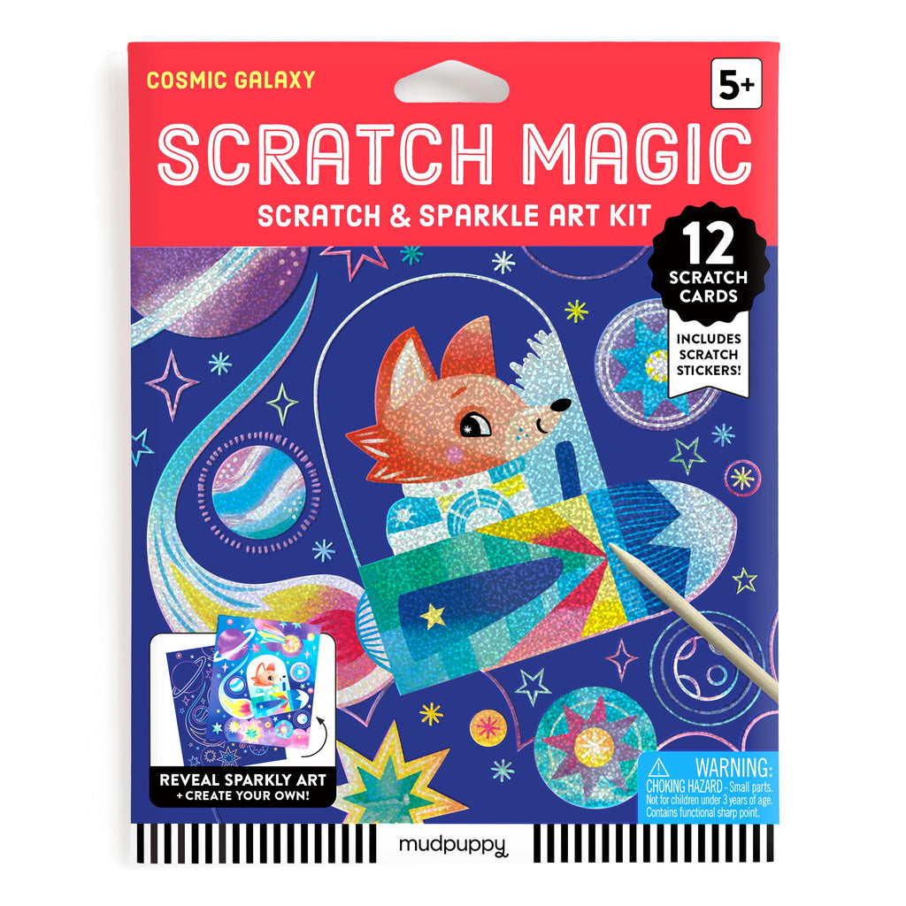 Colorful packaging for Katie Wood’s Cosmic Galaxy Scratch Magic features a fox in a rocket ship among stars and planets. Kit includes 12 scratch cards and sparkle stickers—perfect creative fun for young astronauts ages 5+.