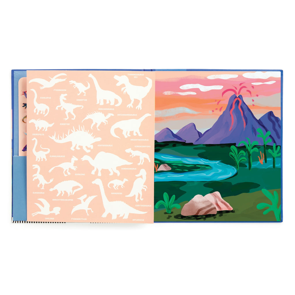 An open book from the Christiane Engel Dinosaur Park Sticker Play Reusable Activity Set shows white dinosaur silhouettes and names on the left, while the right depicts a lively Jurassic world with a volcano, greenery, and river.