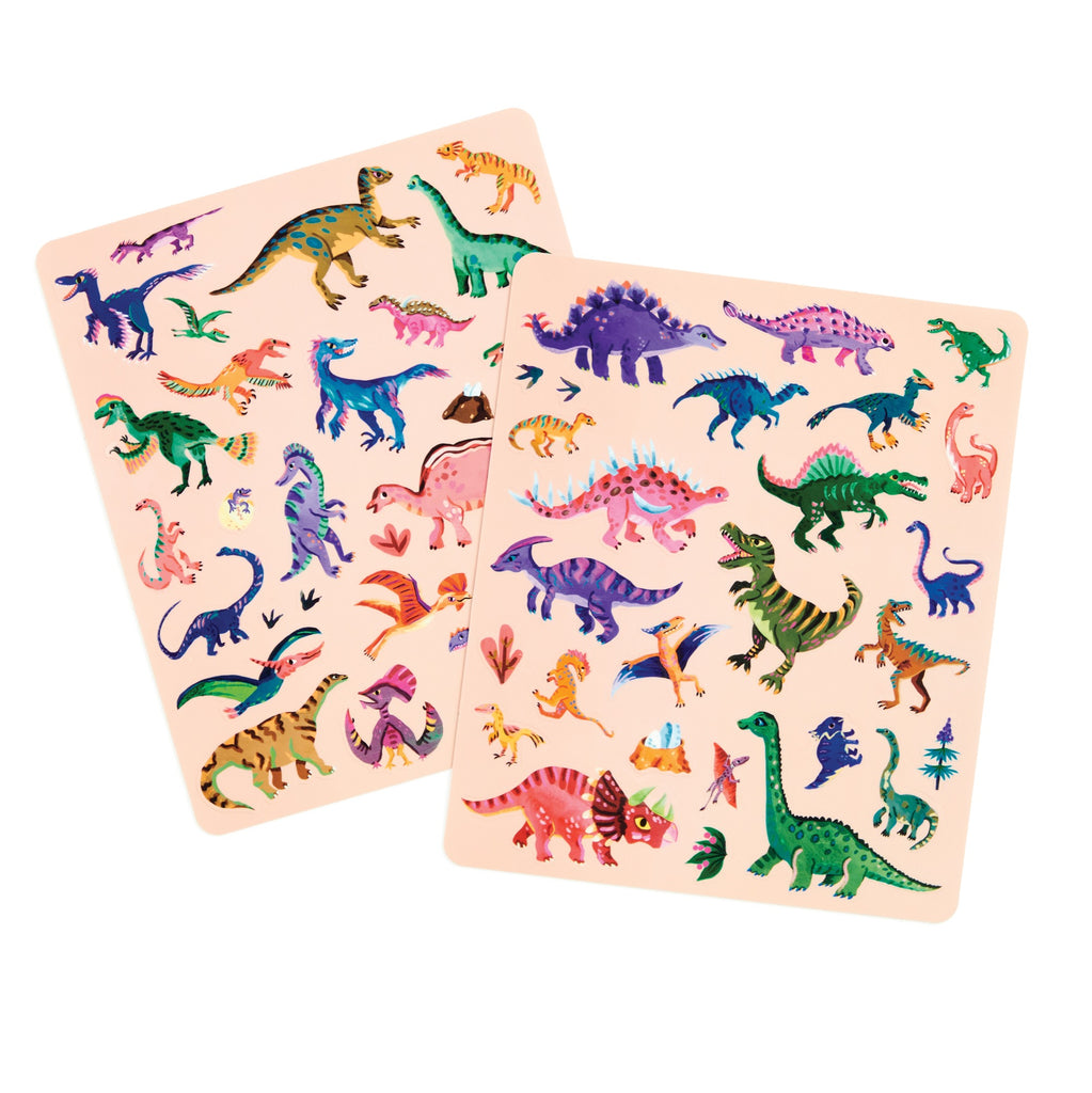 The Christiane Engel Dinosaur Park Sticker Play Reusable Activity Set includes two sheets of vibrant dinosaur stickers in green, purple, pink, orange, and blue, plus plant and footprint stickers.