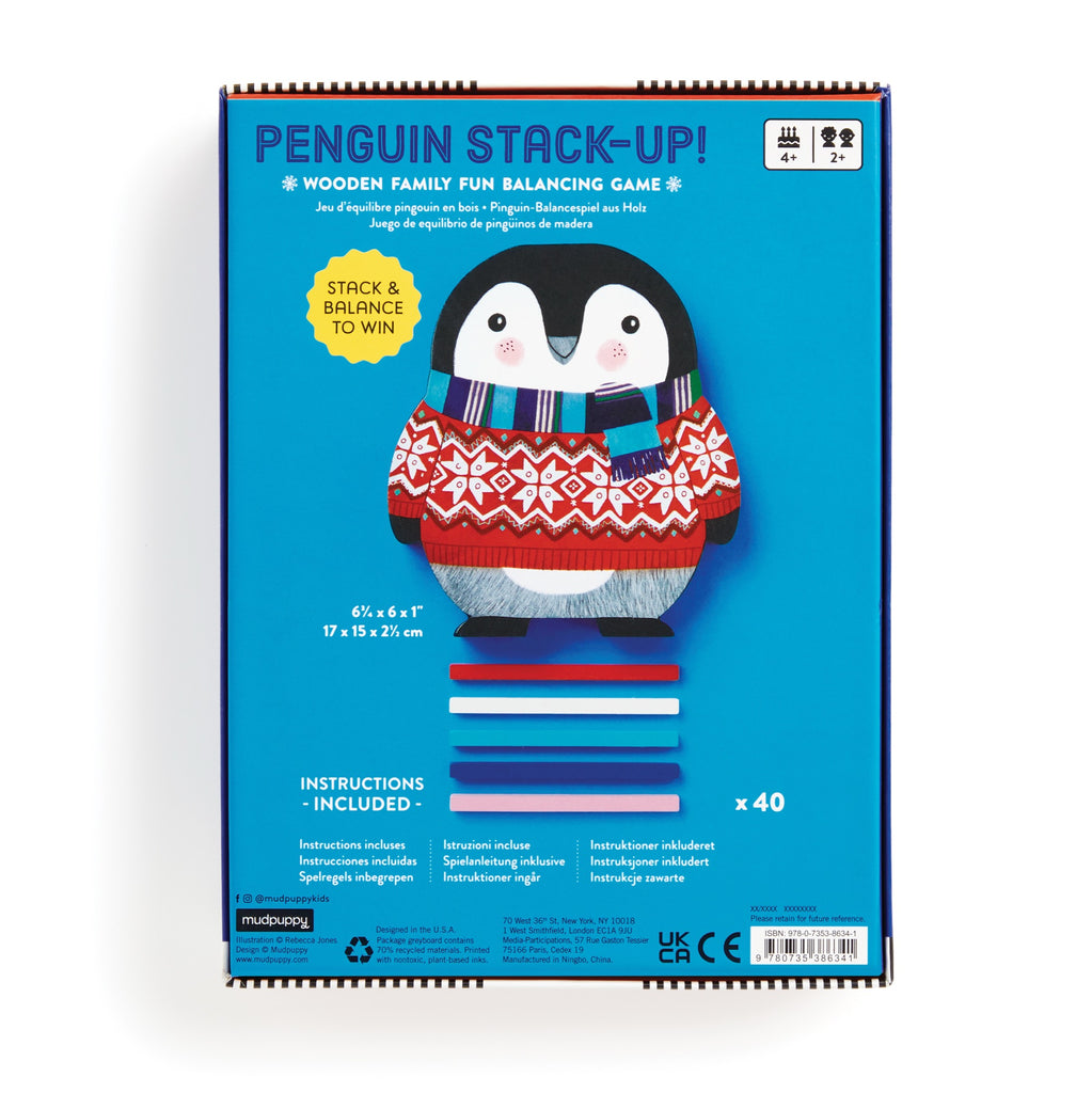 A Rebecca Jones Penguin Stack-up Wooden Balancing Game box shows a cartoon penguin in a red sweater, colorful wooden sticks, and details for ages 4+, 2+ players, with instructions included. Great for fine motor skills!.