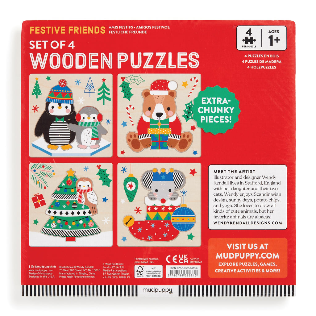 Red box labeled “Festive Friends Set of 4 Wood Puzzles” by Wendy Kendall for ages 1+, includes penguin, bear, fox, and cat in festive outfits. Features extra-chunky pieces and artist info—ideal for holiday fun!.