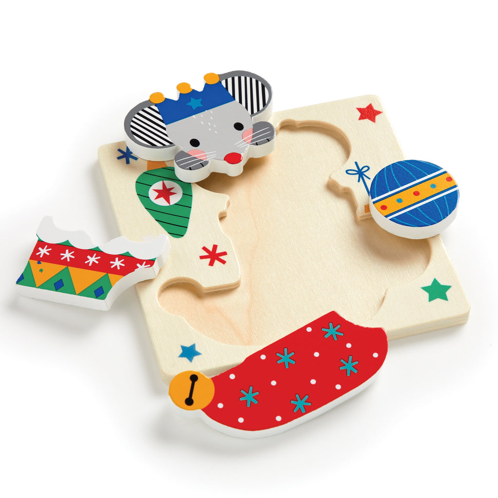 The Wendy Kendall Festive Friends Set of 4 Wood Puzzles features a crowned mouse, blue ornament, red stocking, and green-red present on a starry board—holiday fun for kids!.