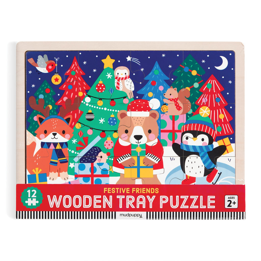The Wendy Kendall Festive Friends 12 Piece Wooden Tray Puzzle features holiday characters with gifts by Christmas trees. Perfect for ages 2+, this colorful puzzle promises festive fun!.